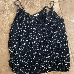 So flowy tank black with white flowers worn once